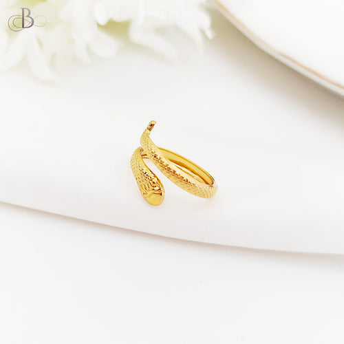 Anillo de acero serpiente dorada