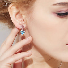Cargar imagen en el visor de la galería, Aretes corazón y punto de luz con cristales Swarovski
