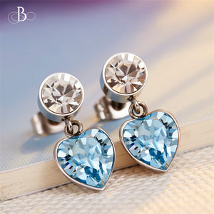 Aretes corazón y punto de luz con cristales Swarovski