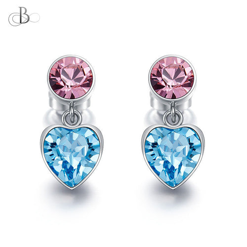 Aretes corazón y punto de luz con cristales Swarovski