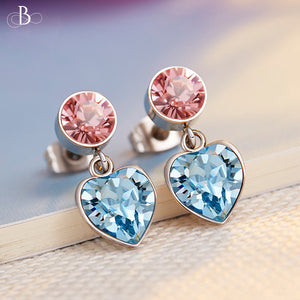 Aretes corazón y punto de luz con cristales Swarovski
