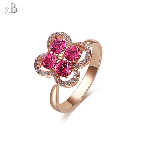 Anillo flor giratoria con cristales Swarovski