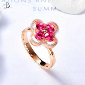 Anillo flor giratoria con cristales Swarovski