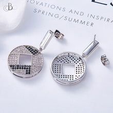 Cargar imagen en el visor de la galería, Aretes disco con cristales Swarovski