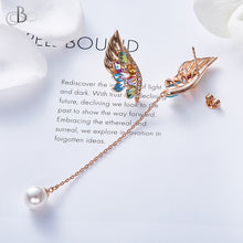 Cargar imagen en el visor de la galería, Aretes alas con cristales y perla Swarovski