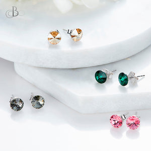 Aretes puntos de luz en colores variados