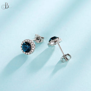 Aretes de plata punto de luz enmarcado con cristales Swarovski