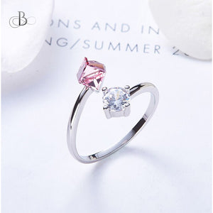 Anillo de plata puntos de luz y color rosa con cristales Swarovski