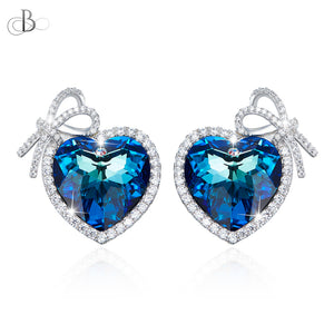 Aretes de plata corazón con cristal Swarovski envueltos en cinta de plata