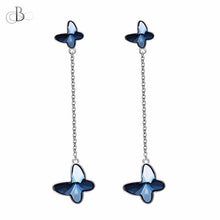 Cargar imagen en el visor de la galería, Aretes mariposas de plata colgantes con cristales Swarovski