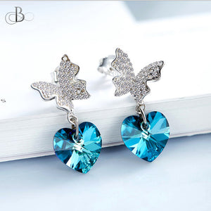Aretes mariposa brillante y corazón de plata color zafiro con cristales Swarovski