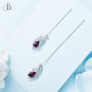 Aretes colgantes de plata color amatista de pluma con cristales Swarovski