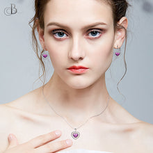 Cargar imagen en el visor de la galería, Aretes corazón de plata colgante con cristales Swarovski
