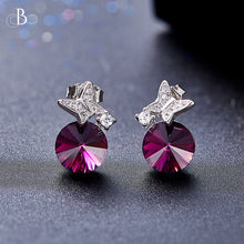 Cargar imagen en el visor de la galería, Aretes mariposa y punto de luz de plata color amatista con cristales Swarovski