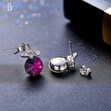 Cargar imagen en el visor de la galería, Aretes mariposa y punto de luz de plata color amatista con cristales Swarovski