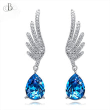 Cargar imagen en el visor de la galería, Aretes de plata alas de ángel con cristales Swarovski