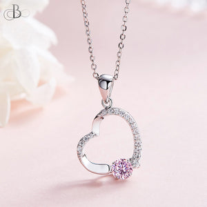 Collar de plata corazón y punto de luz rosa con cristales Swarovski