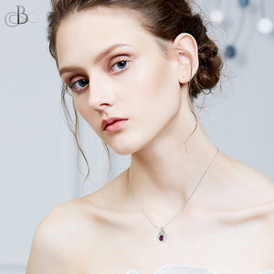 Collar de plata pluma color amatista con cristales Swarovski