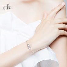 Cargar imagen en el visor de la galería, Pulsera de plata pareja de cisnes con cristales Swarovski