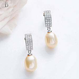Aretes de plata colgantes con perlas y cristales Swarovski