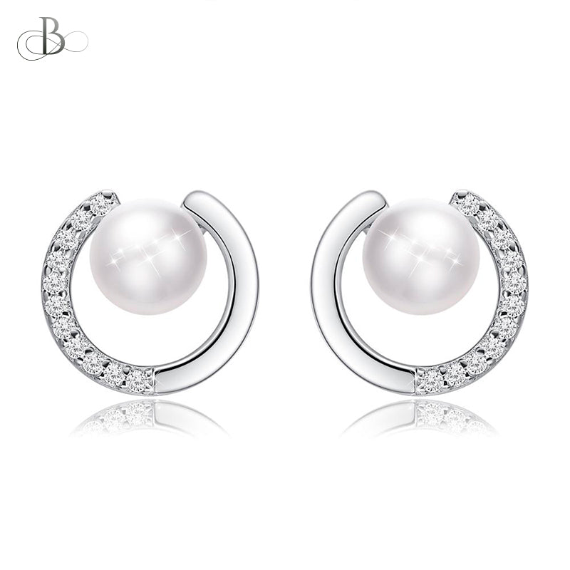Aretes de plata perla y zirconias brillantes