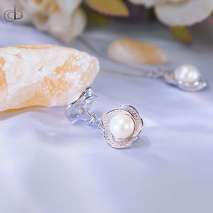 Aretes de plata flores de perla