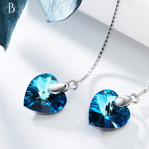Aretes de plata colgantes corazón con cristales Swarovski color zafiro