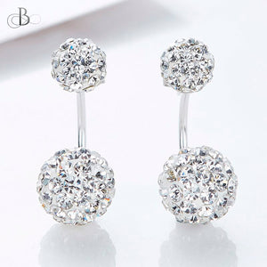 Aretes de plata esferas mellizas brillantes