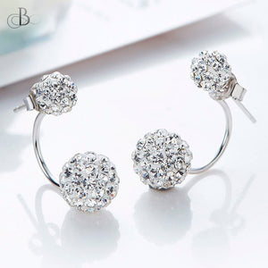 Aretes de plata esferas mellizas brillantes