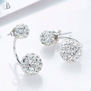 Aretes de plata esferas mellizas brillantes