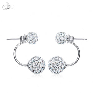 Aretes de plata esferas mellizas brillantes
