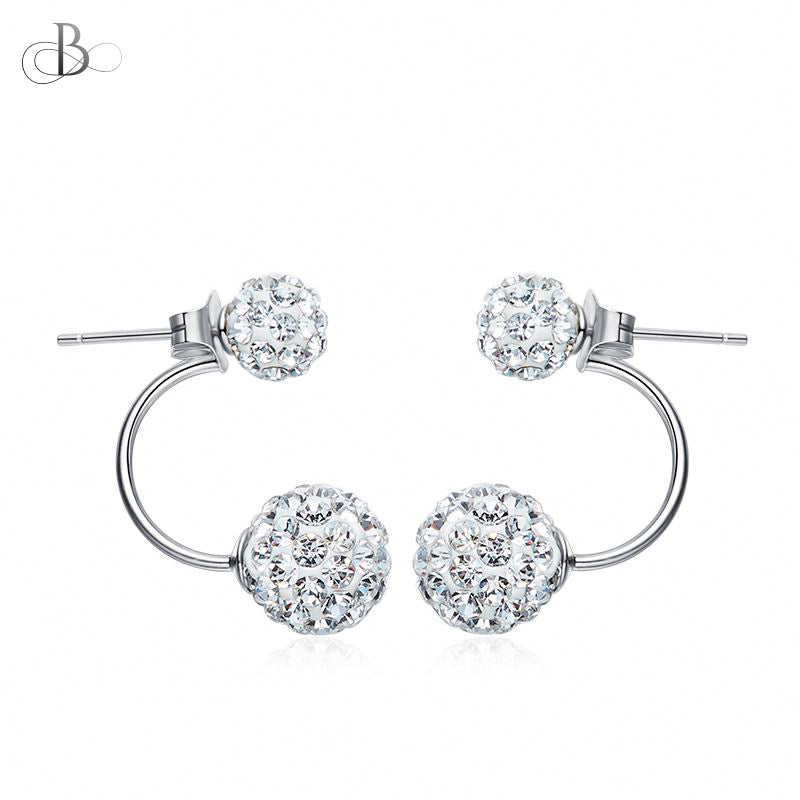 Aretes de plata esferas mellizas brillantes