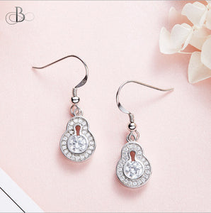 Aretes de plata punto de luz colgante con zirconia y cristales Swarovski
