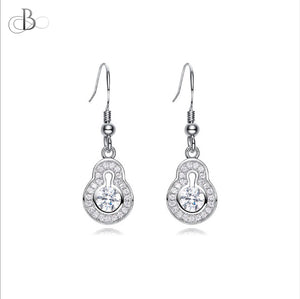 Aretes de plata punto de luz colgante con zirconia y cristales Swarovski