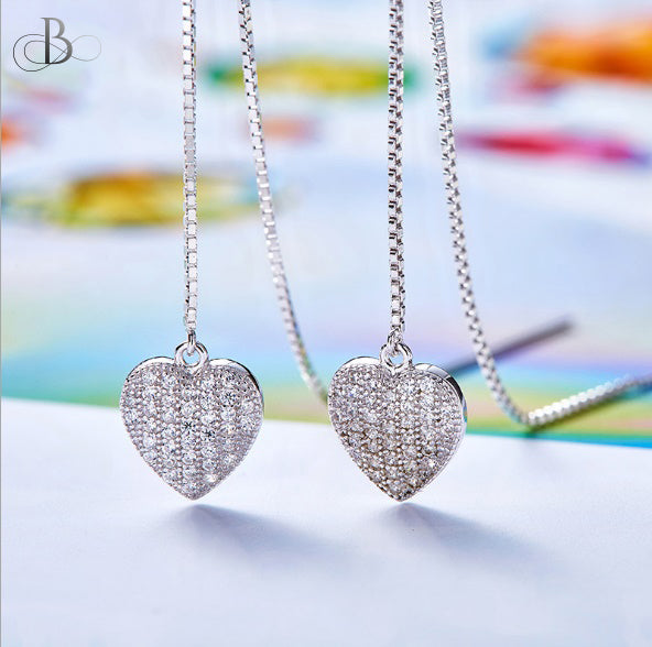 Aretes corazones de plata brillantes colgantes con zirconia Swarovski
