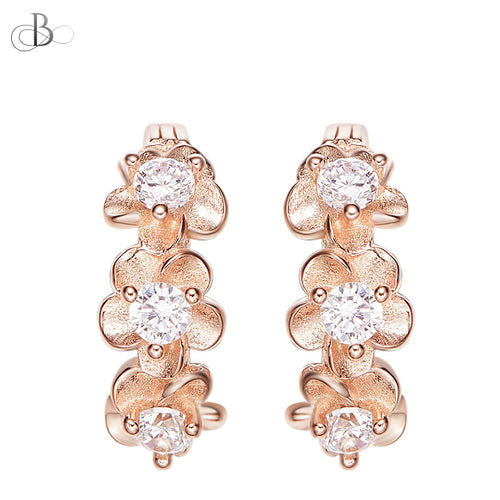 Aretes de plata flores doradas embellecidas con cristales Swarovski