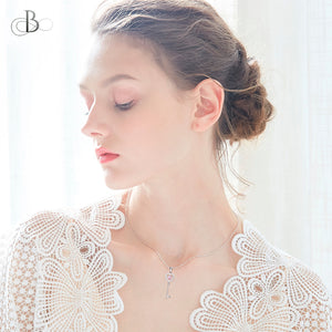 Collar de plata llave del corazón con zirconia danzante