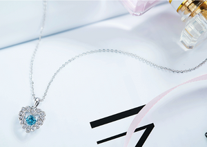 Collar de plata corazón con zirconia danzante y cristales Swarovski