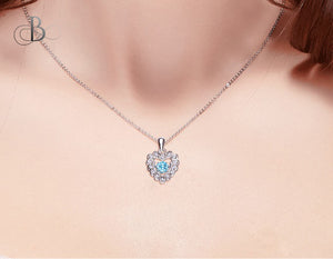Collar de plata corazón con zirconia danzante y cristales Swarovski