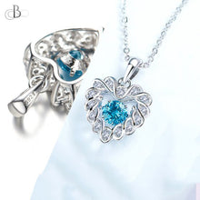 Cargar imagen en el visor de la galería, Collar de plata corazón con zirconia danzante y cristales Swarovski